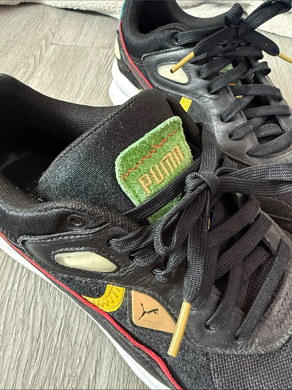 PUMA Street Rider Unity Black Red Green Sneakers